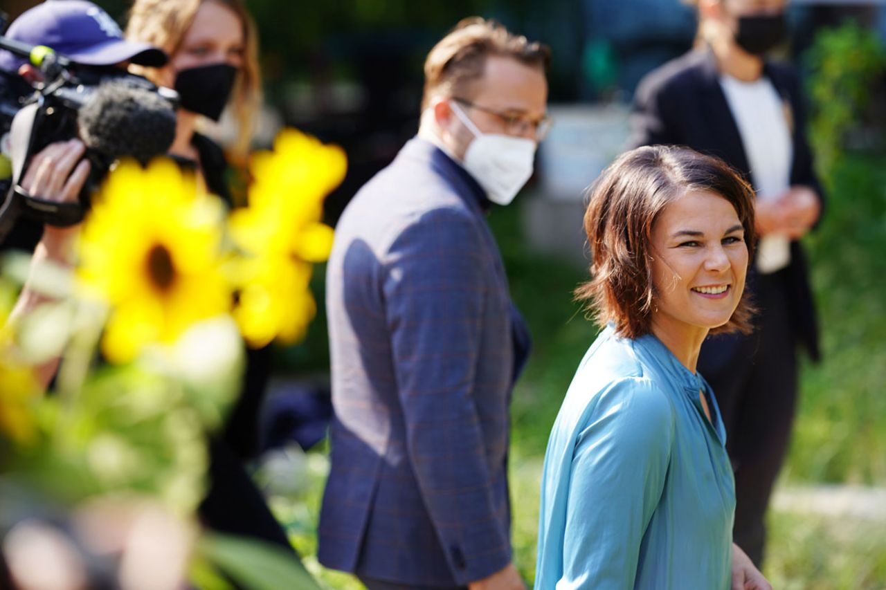 Annalena Baerbock leaves after casting her vote in Potsdam.