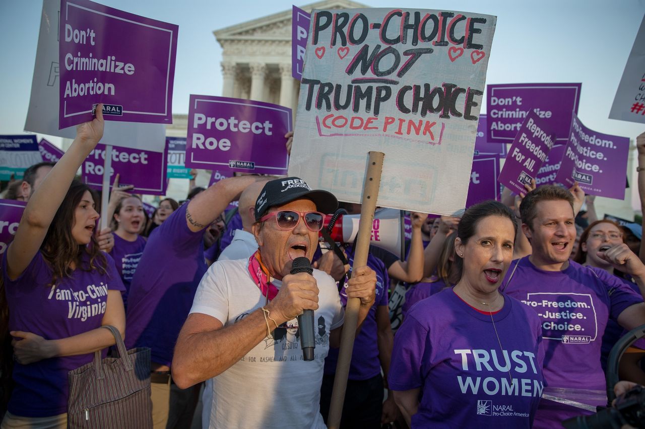 Pro-choice and anti-abortion protesters demonstrate in front of the US Supreme Court on Monday