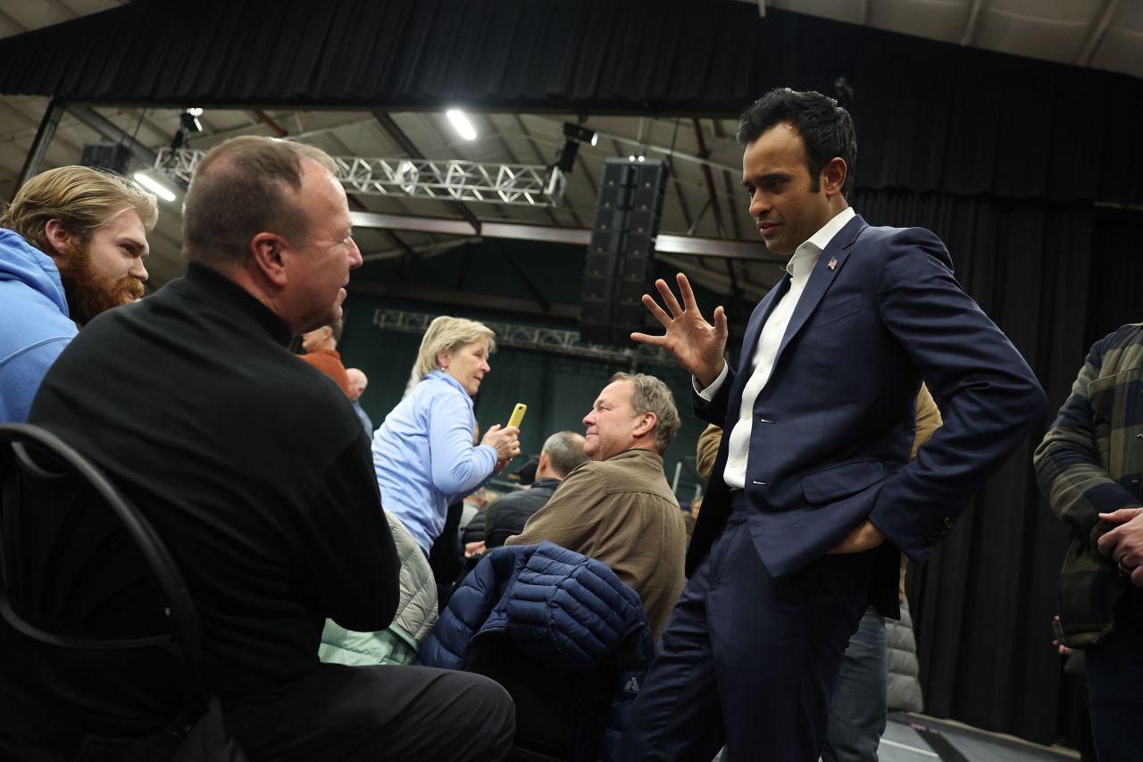 Vivek Ramaswamy greets voters during a visit to a caucus site at the Horizon Event Center on Monday in Des Moines.