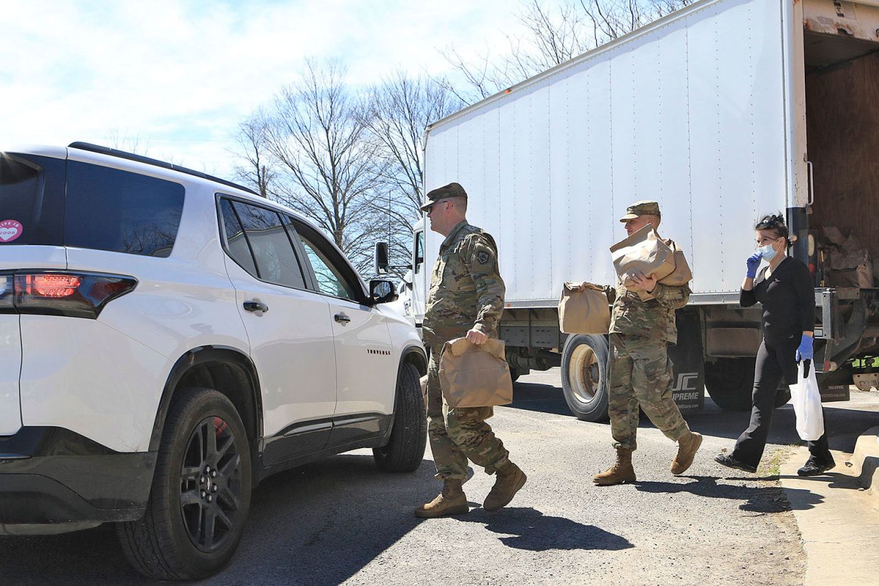 West Virginia National Guard members distribute bags meals for students at Mountain View Elementary School in Union, West Virginia on March 30.