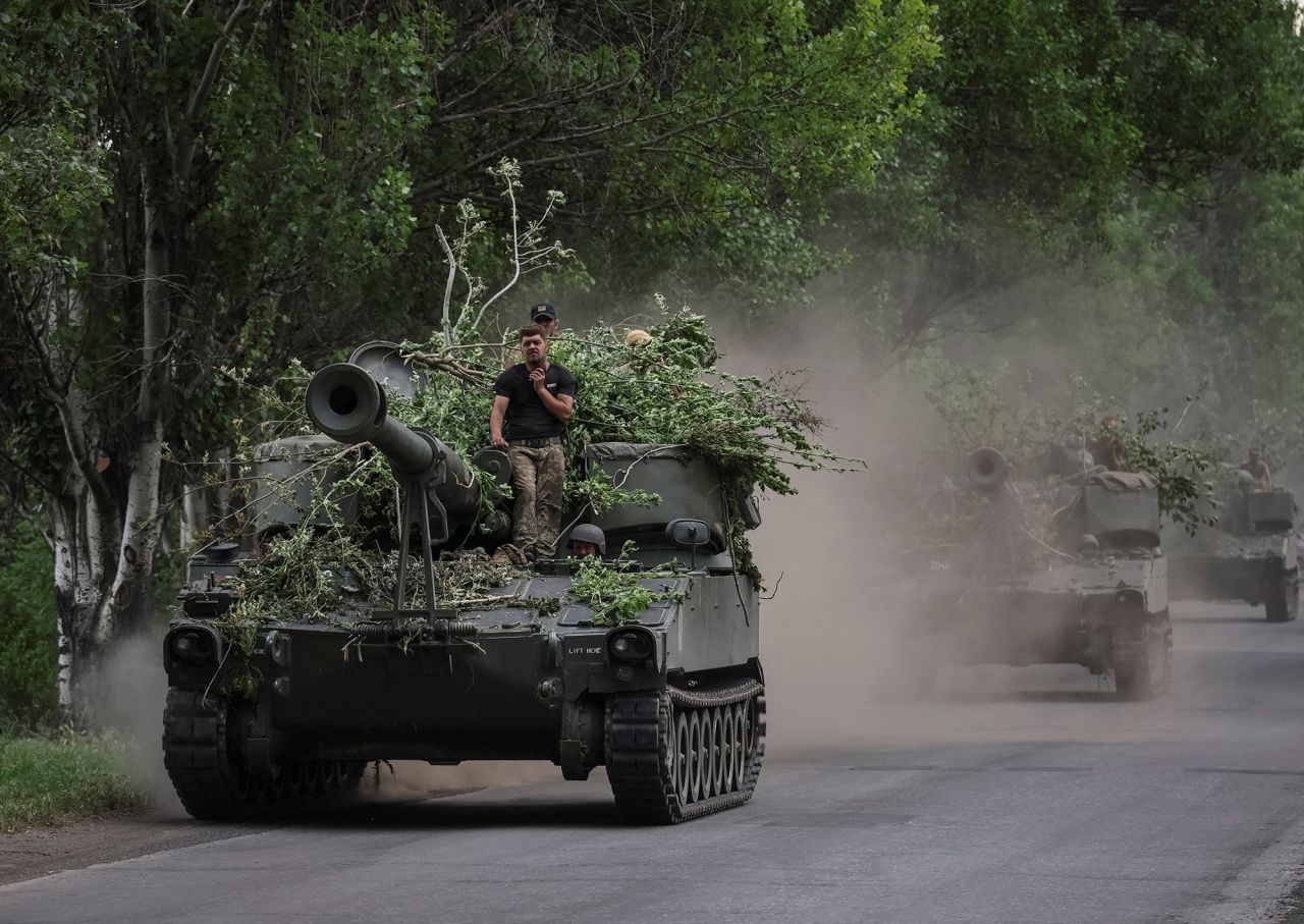 Ukrainian servicemen ride American 155 mm turreted self-propelled howitzers M109 in the Donetsk region, Ukraine, on June 13.