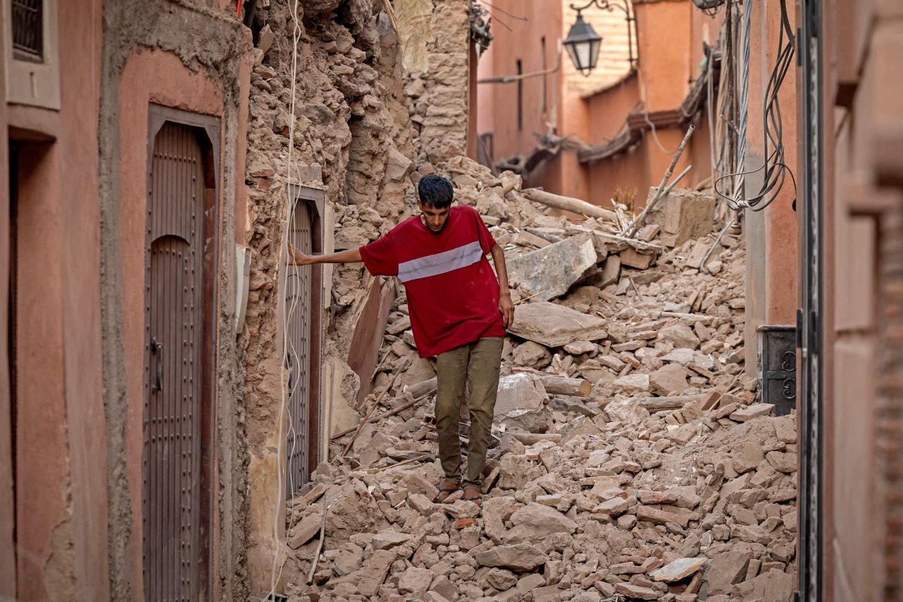 A resident navigates through the rubble in Marrakech, Morocco, on Saturday, September 9.