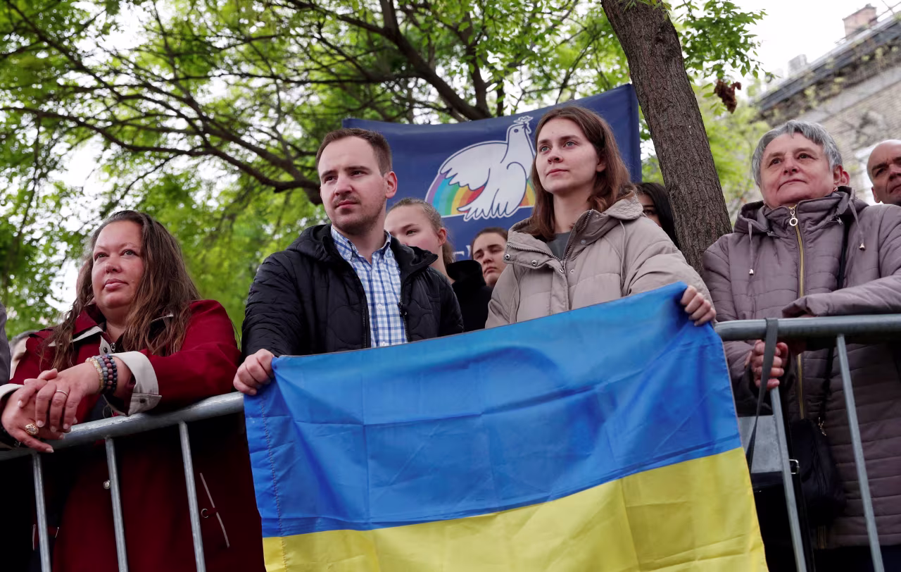 Ukrainians stand outside the St. Elizabeth of Hungary Church in Budapest on April 29. 