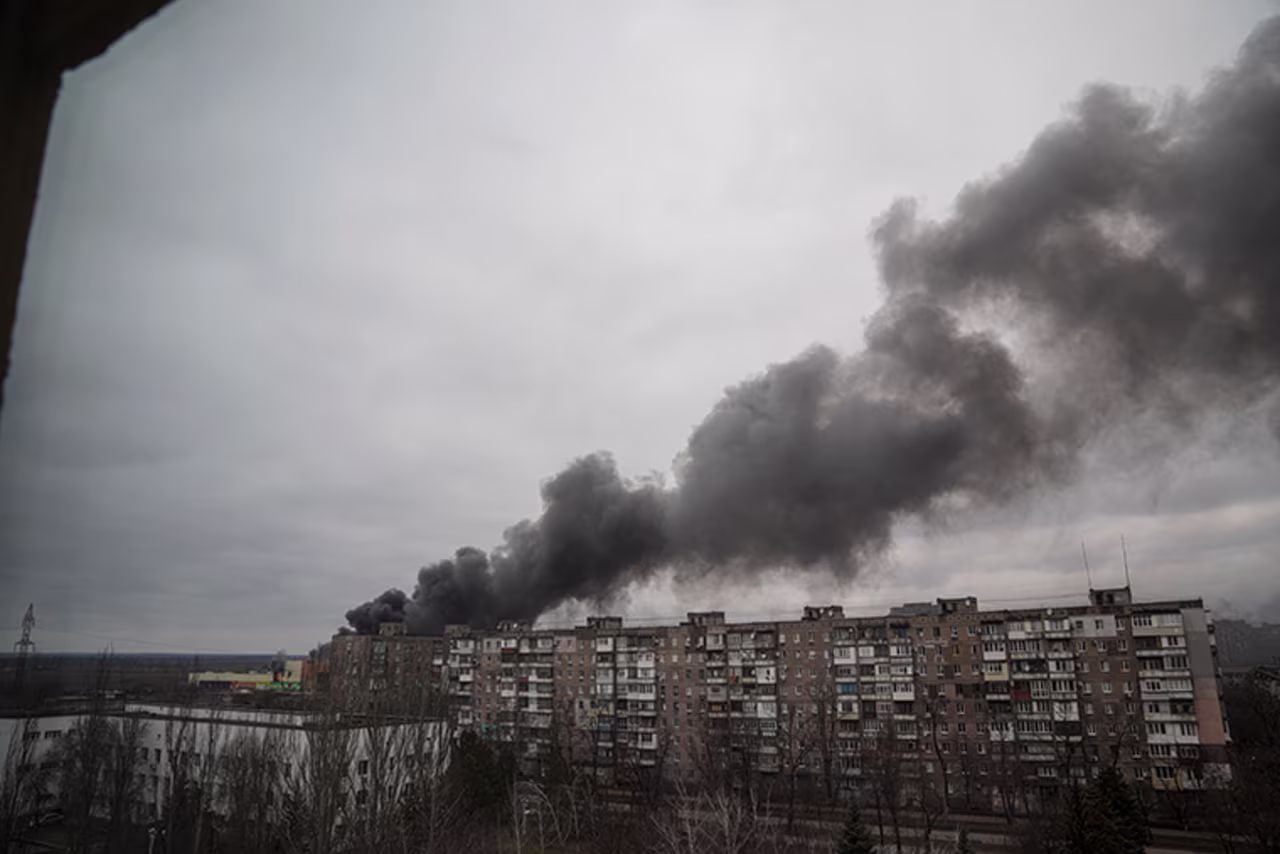 Smoke rises after apparent shelling by Russian forces in Mariupol, Ukraine, Friday, March 4.