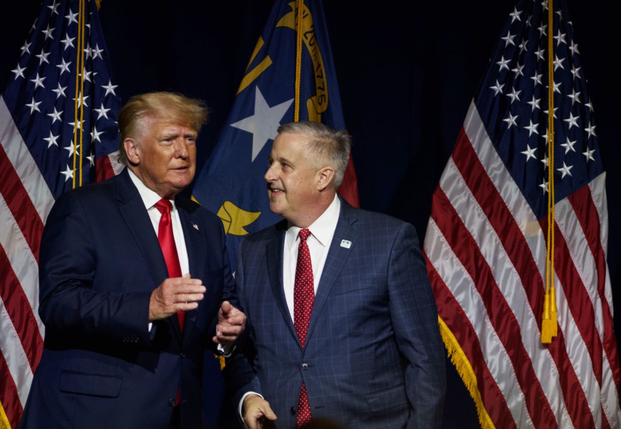 Former President Donald Trump takes the stage with NCGOP Chairman Michael Whatley after being announced at the NCGOP state convention on June 5, 2021 in Greenville, North Carolina.?