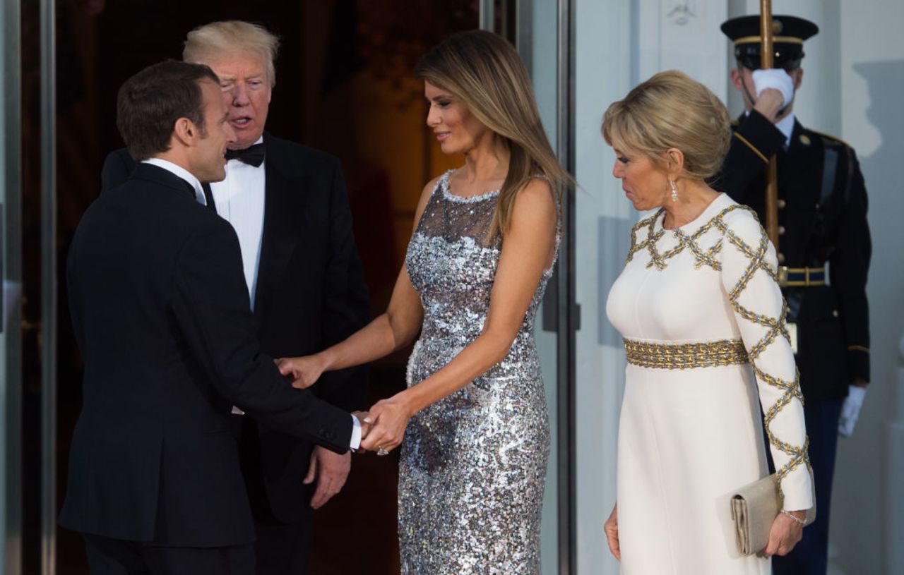 US President Donald Trump (2nd L) and First Lady Melania Trump welcome French President Emmanuel Macron and his wife, Brigitte Macron.