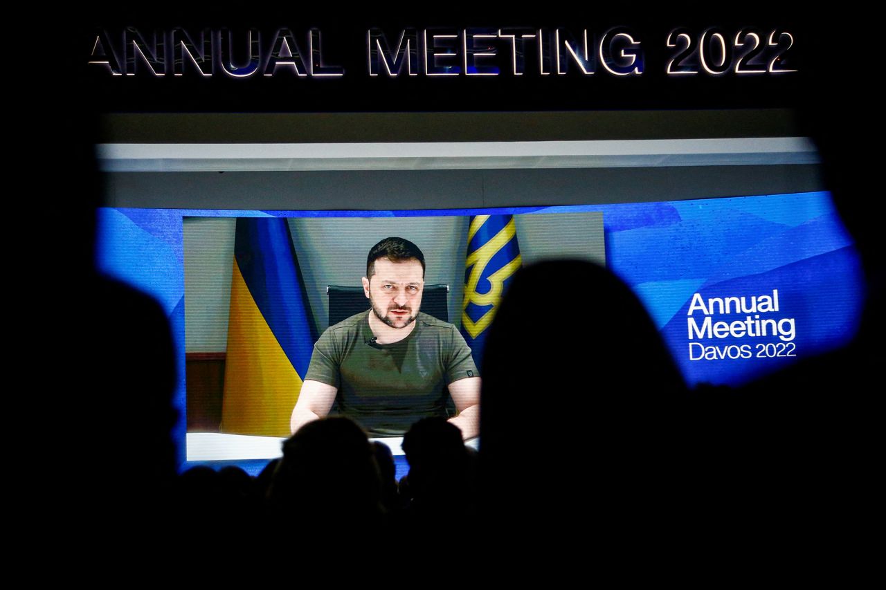 Ukraine's President Volodymyr Zelensky is seen on a screen as he delivers a video address to the delegates of the World Economic Forum (WEF) in Davos, Switzerland, on May 23.