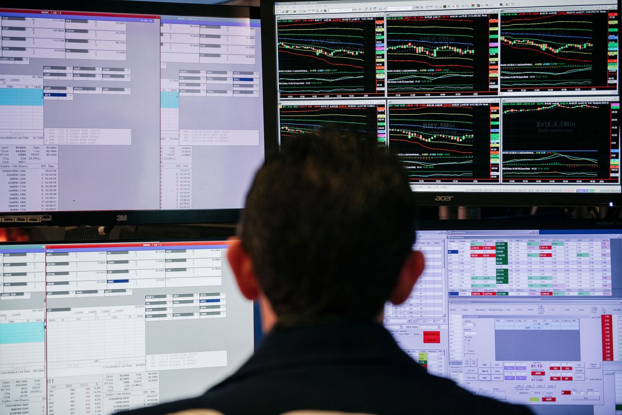 A trader works at the New York Stock Exchange on February 25.