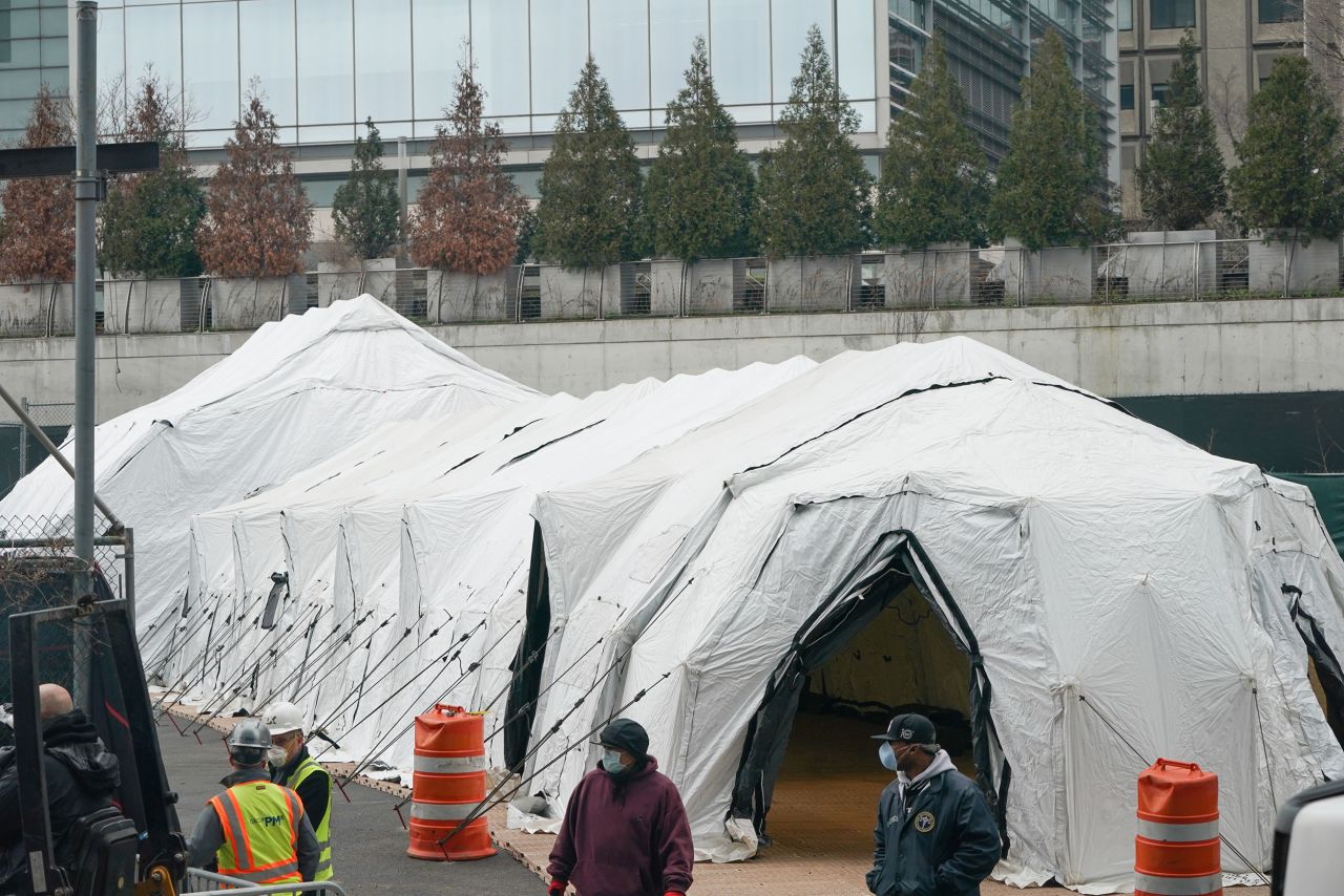 Workers build a makeshift morgue outside of Bellevue Hospital in New York on March 25 to handle the number of coronavirus victims.