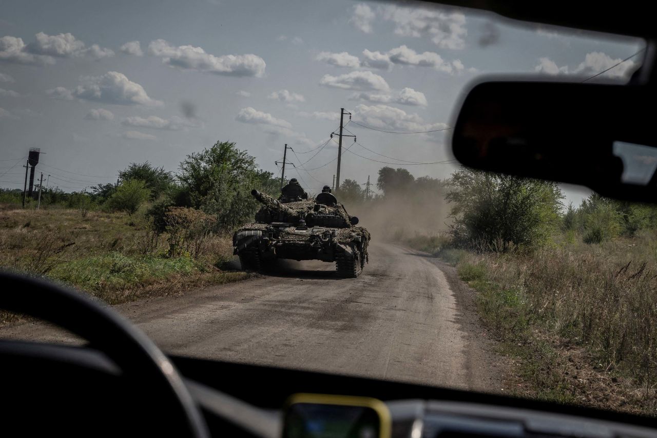 Ukrainian servicemen ride atop a tank near the village of?Robotyne, Ukraine, on August 25. 