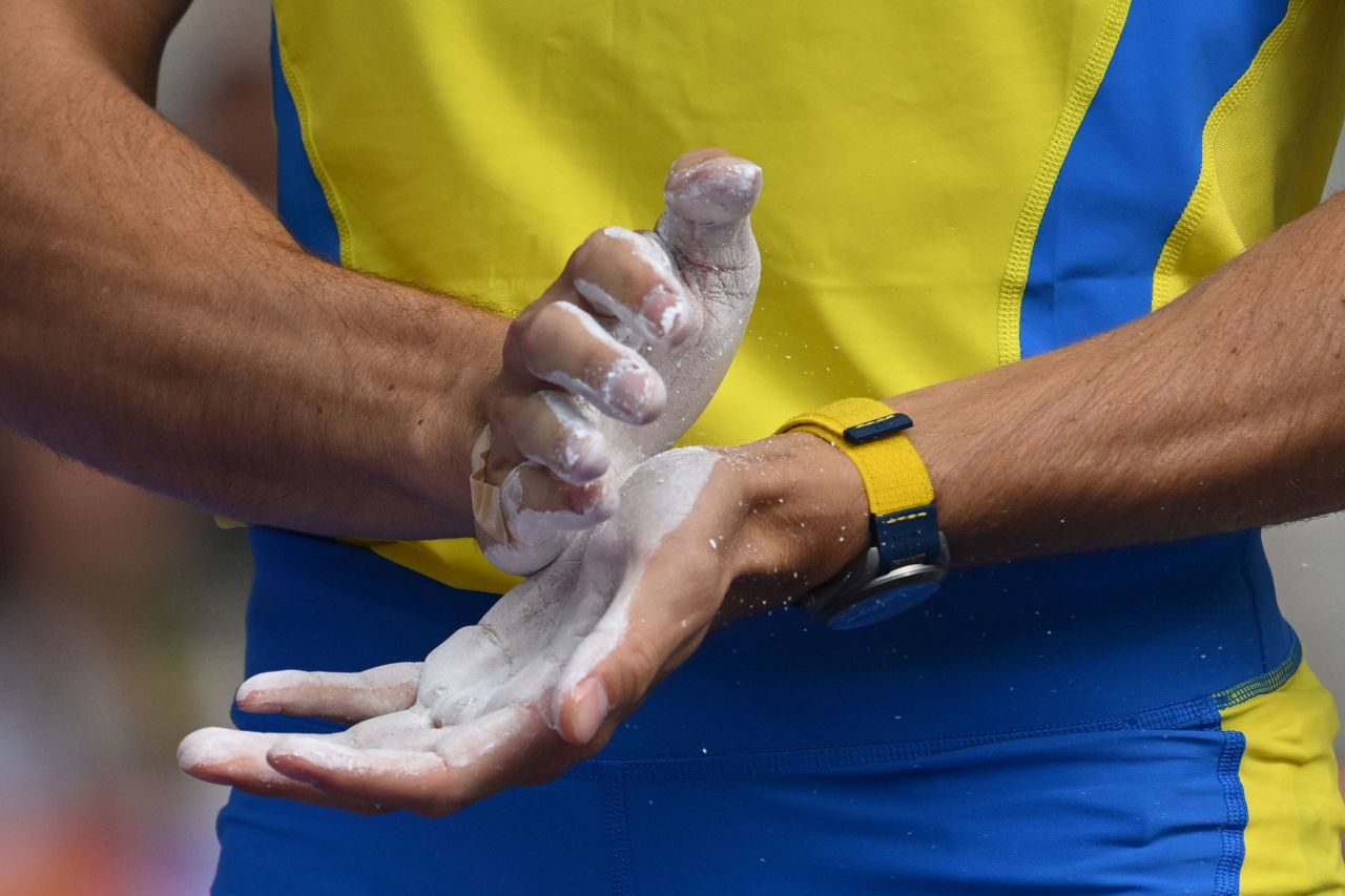 Duplantis puts chalk on his hands August 3. 