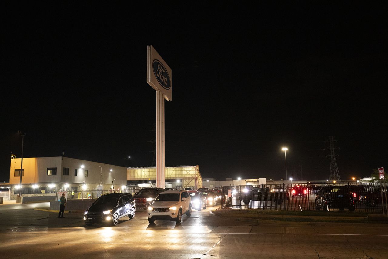 United Auto Workers members exit the plant and go on strike at the Ford Michigan Assembly Plant on September 15, 2023 in Wayne, Michigan. 