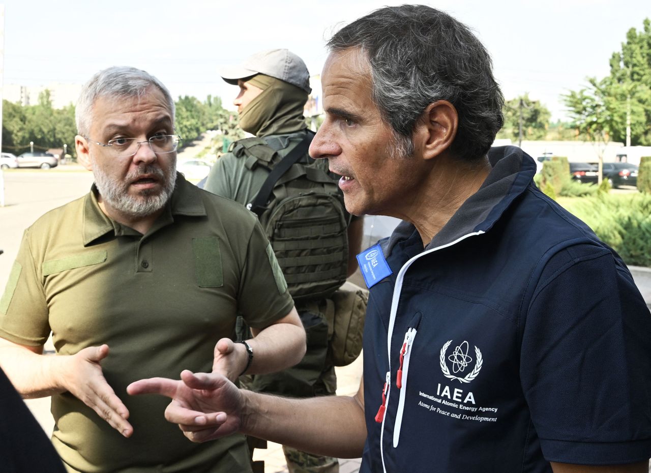 Ukrainian Energy Minister Herman Halushchenko, left speaks with IAEA Director General Rafael Grossi, after the arrival of the IAEA inspection mission to Zaporizhzhia, on August 31.