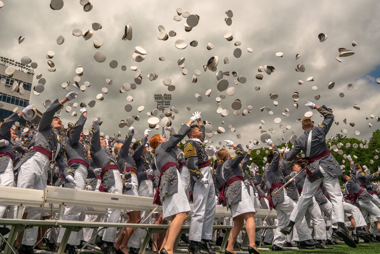 Graduates toss their hats in the air at the end of the US Military Academy Class of 2019 graduation ceremony on May 25, 2019, in West Point, New York. 