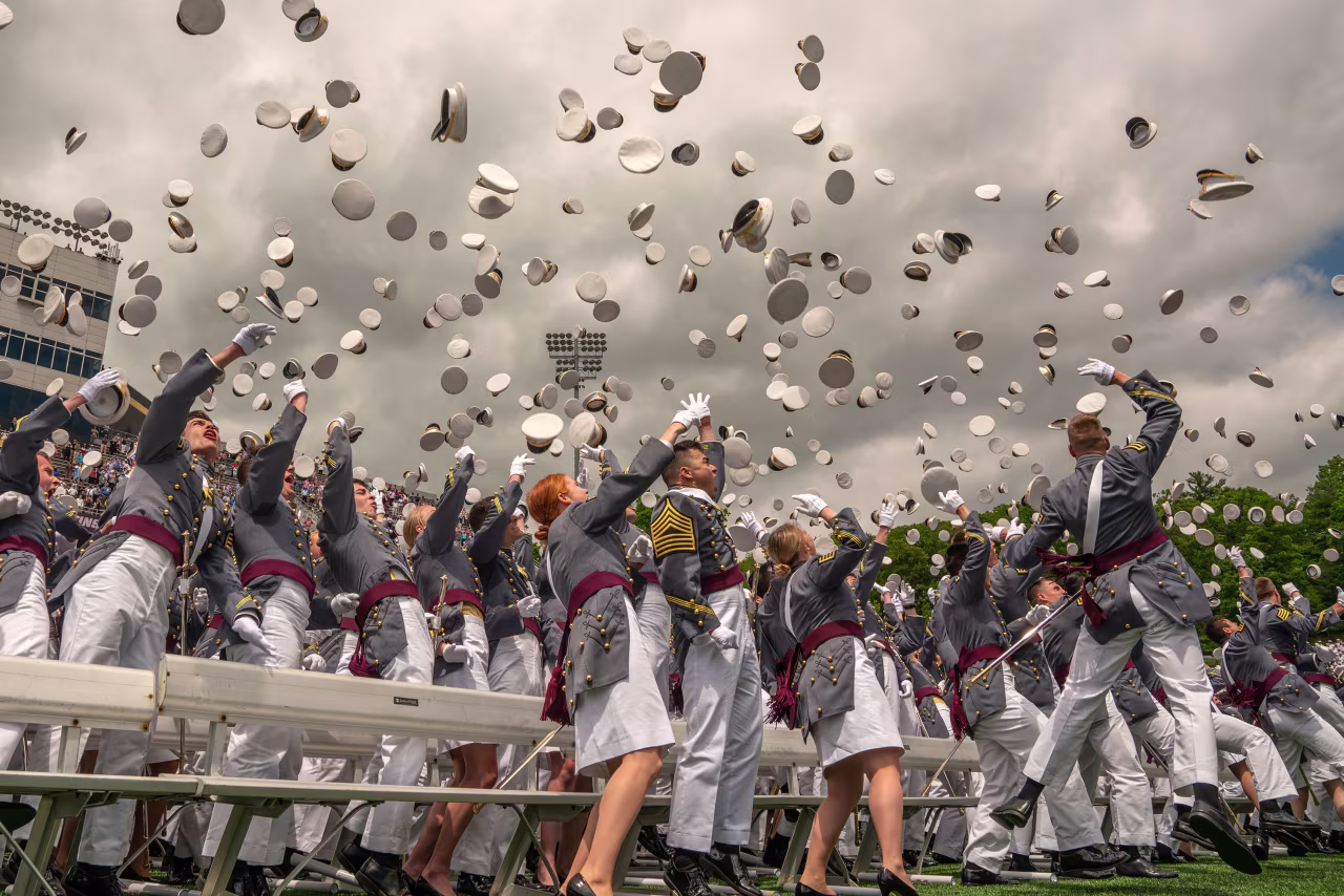 Graduates toss their hats in the air at the end of the US Military Academy Class of 2019 graduation ceremony on May 25, 2019, in West Point, New York. 