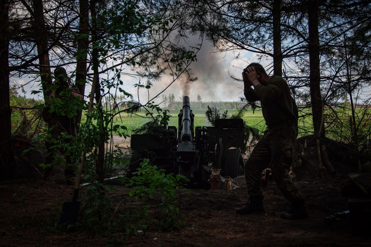 Ukrainian soldiers with the 57th Motorized Brigade operate at an artillery position on June 9 near Vovchansk, Kharkiv Region, Ukraine. 