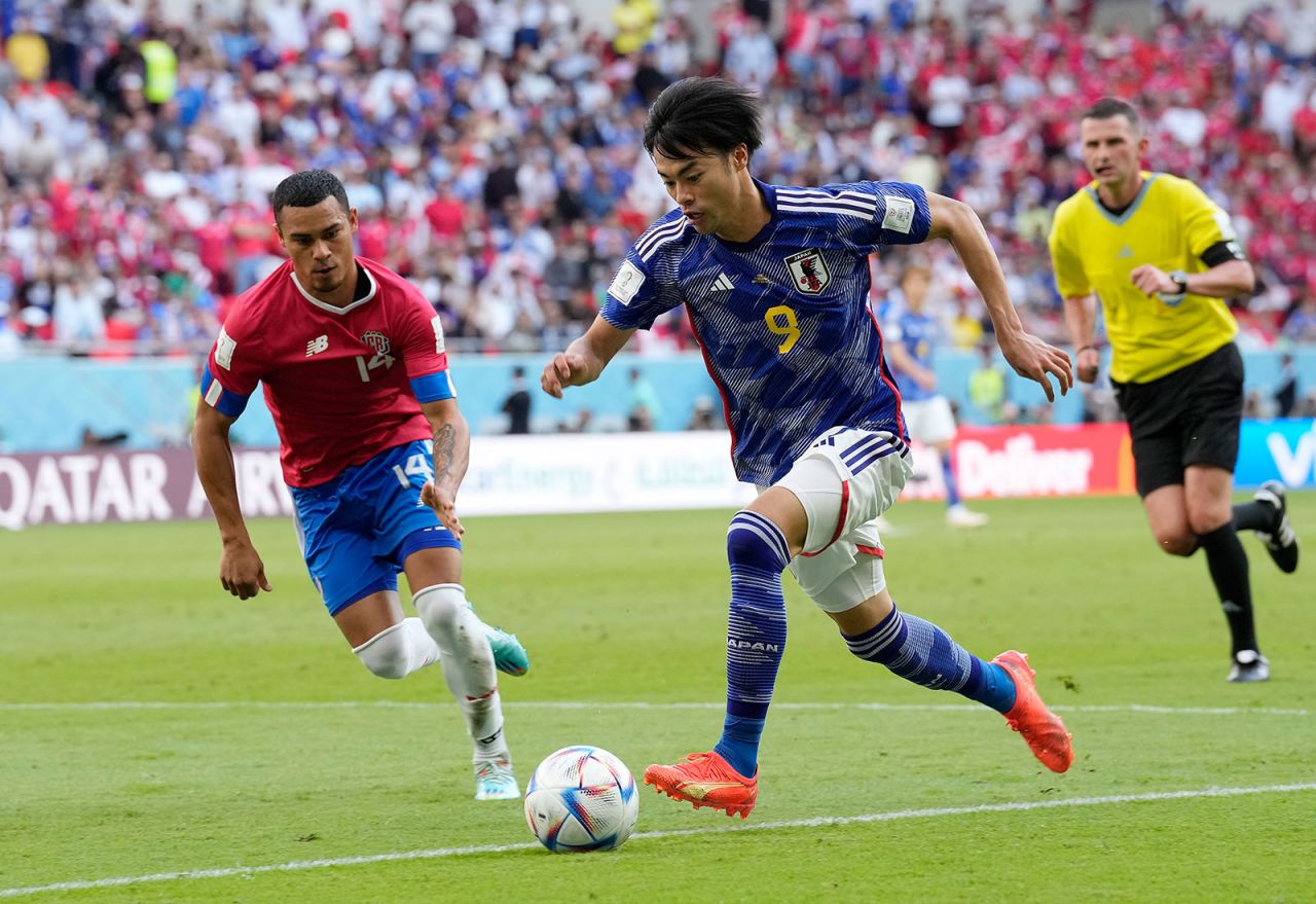 Japan's Kaoru Mitoma runs with the ball during the World Cup match between Japan and Costa Rica on Sunday, November 27. 