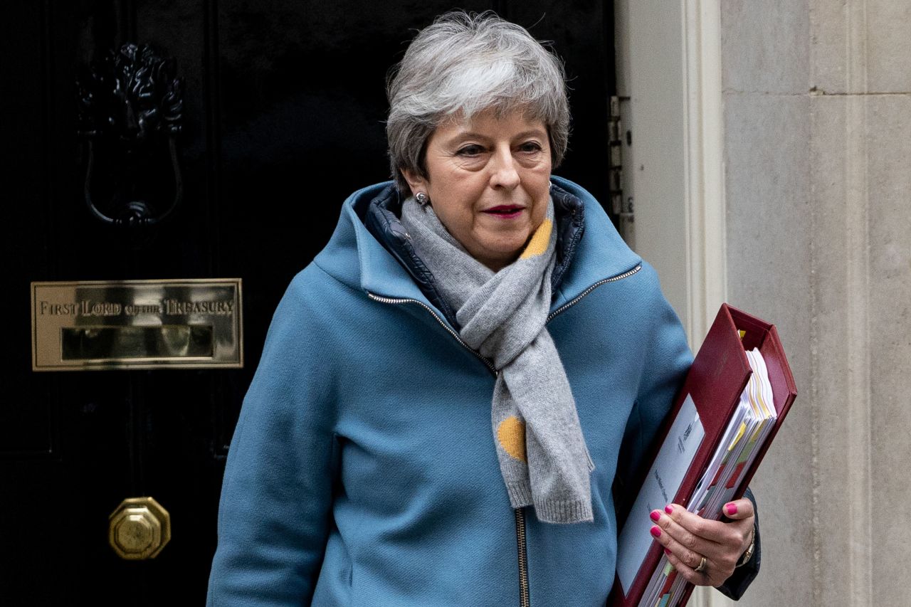 Theresa May leaves for Prime Minister's Questions on Wednesday.