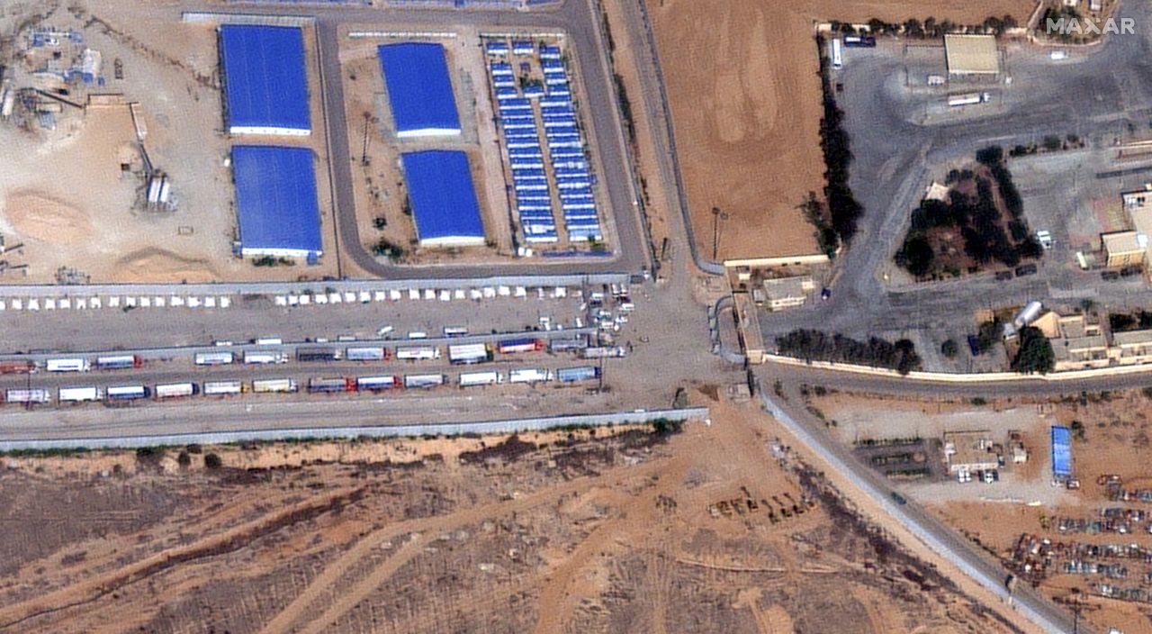 Aid trucks queue on the Egypt side of the Rafah border crossing on October 21. 