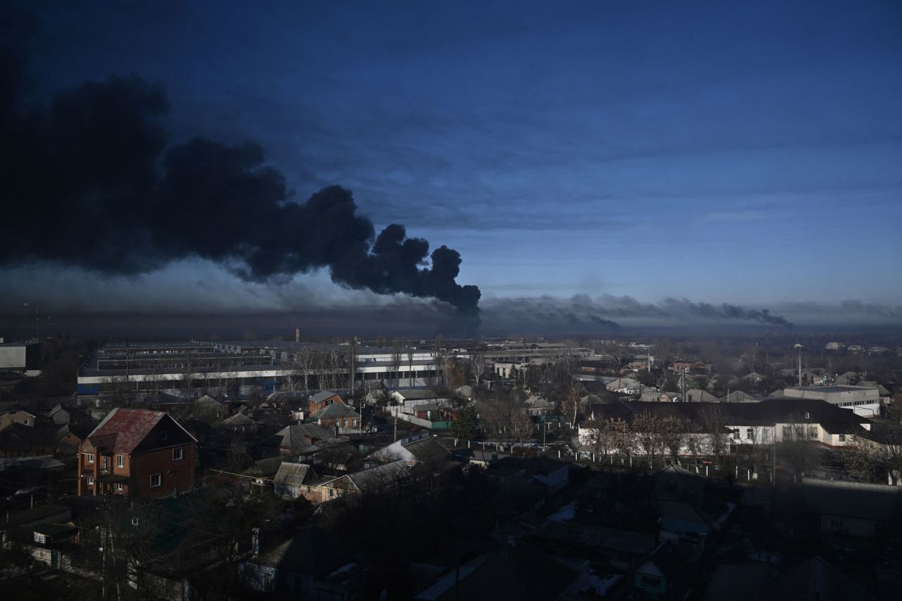Black smoke rises from a military airport in Chuguyev near Kharkiv on February 24