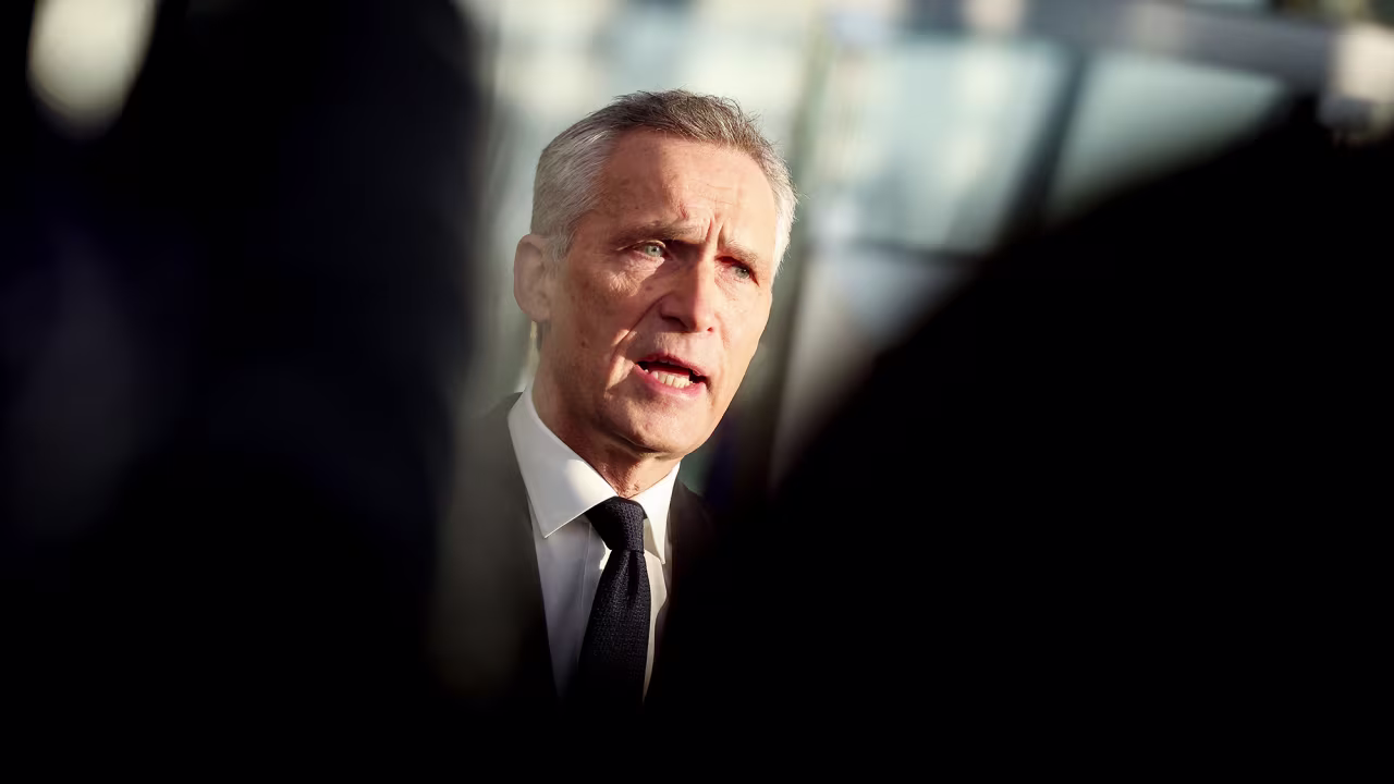 NATO Secretary General Jens Stoltenberg speaks to the press as he arrives for a two-day meeting at the NATO headquarters in Brussels on February 14.