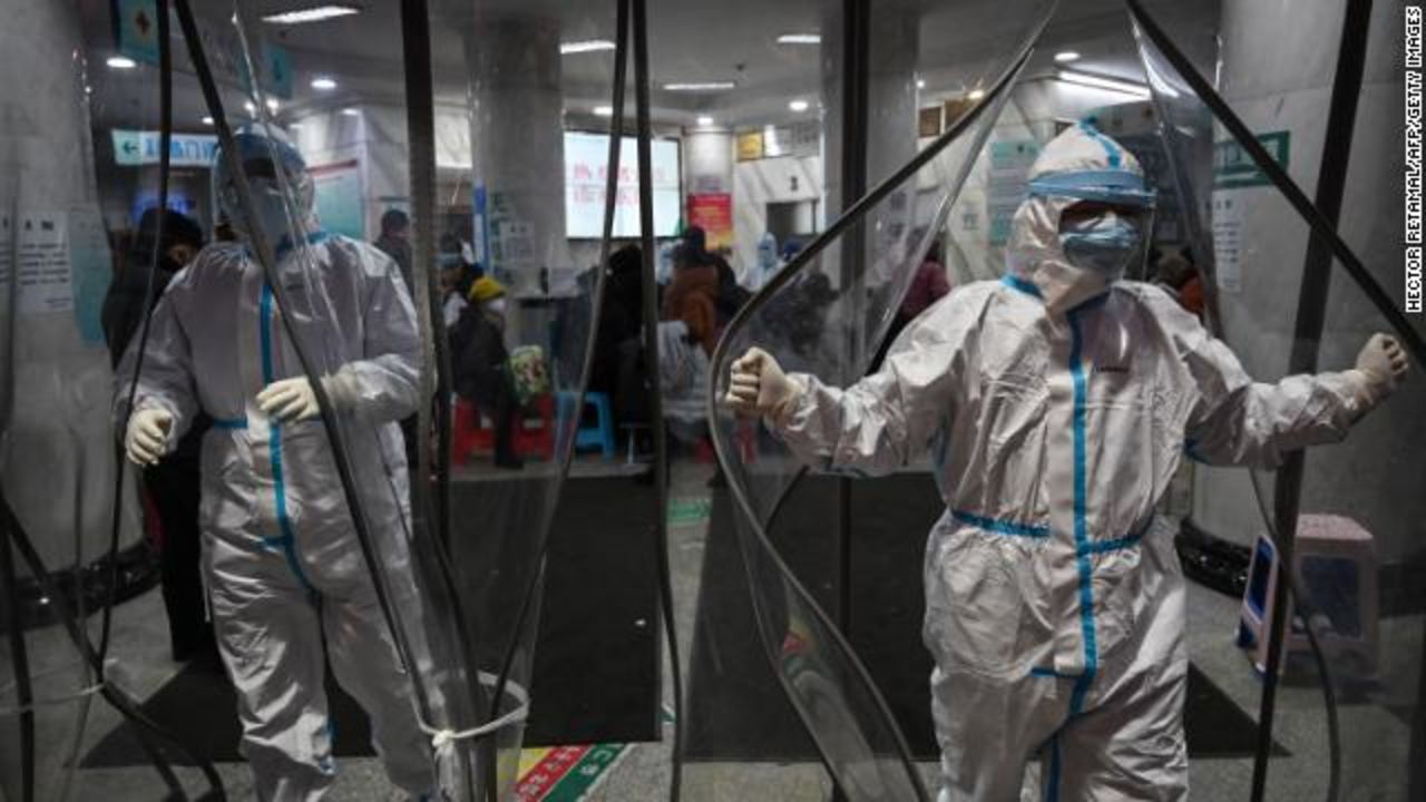 Medical staff members wearing protective clothing in Wuhan.