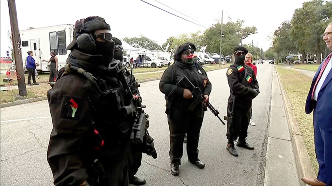 Demonstrators, who described themselves as members of the New Black Panther Party and the Lion of Judah Armed Forces, told CNN that they are there exercising their Second Amendment rights.?