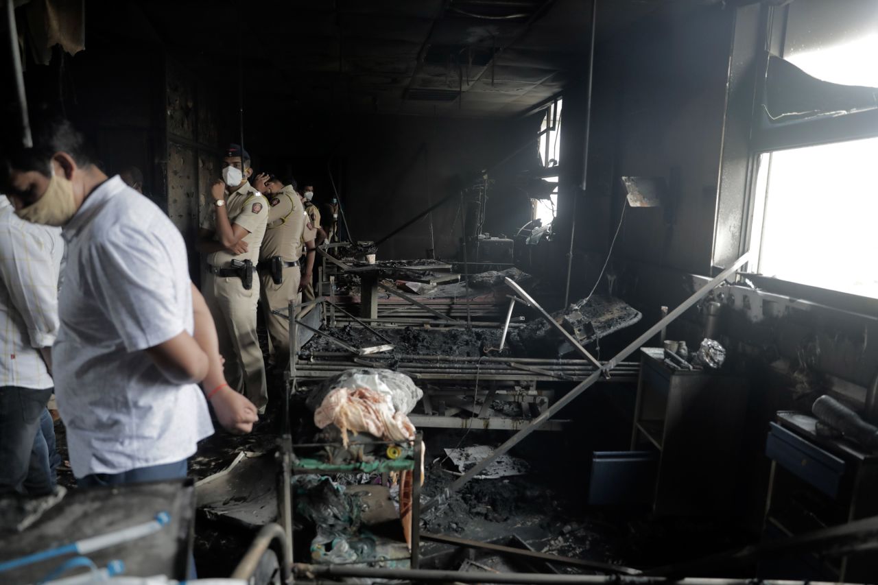 People inspect an ICU ward after a fire broke out in Vijay Vallabh Covid-19 hospital at Virar, near Mumbai, India, on Friday, April 23.