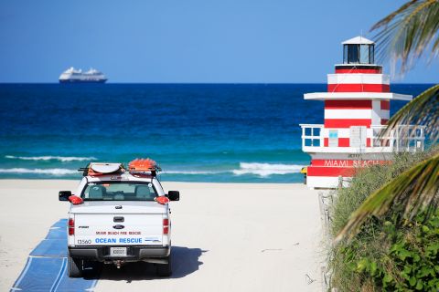 A Miami Beach Fire Rescue vehicle drives onto the beach in South Pointe in Miami Beach, Florida on April 29.