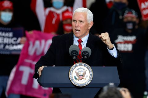 US Vice President Mike Pence speaks during a "Make America Great Again!" campaign event at Oakland County International Airport in Waterford, Michigan, on October 22.