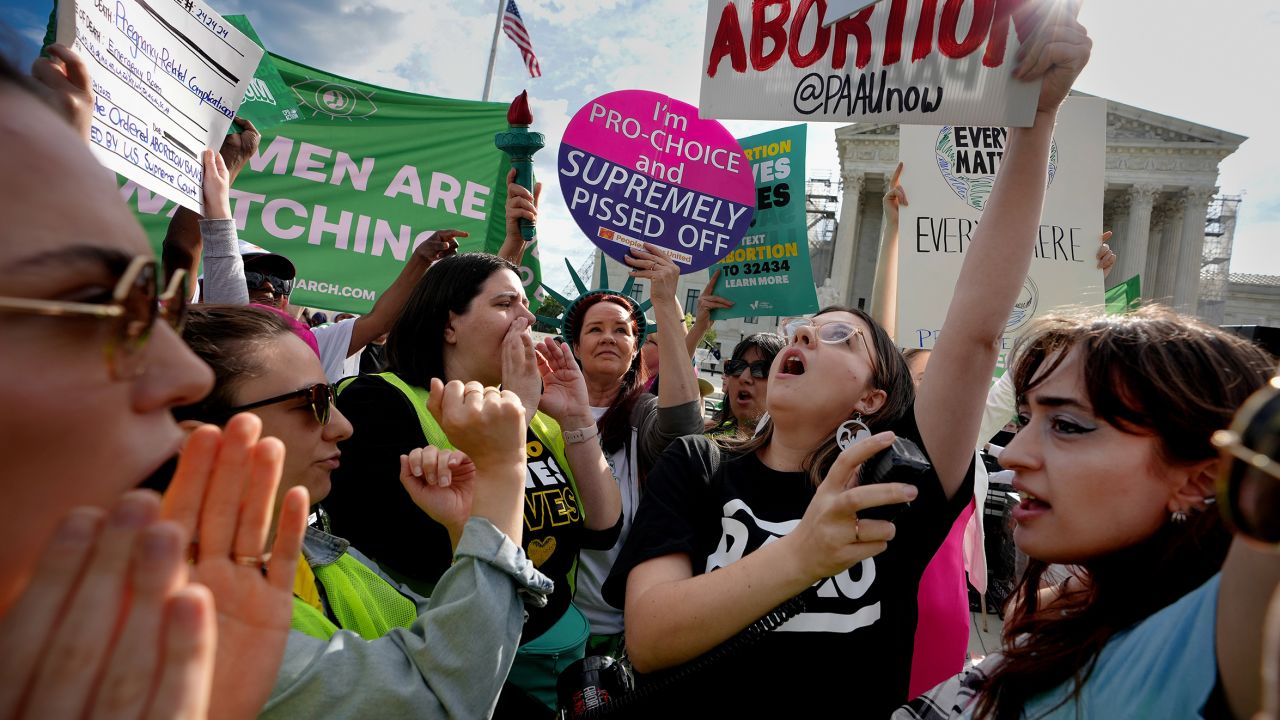 Abortion rights advocates and anti-abortion opponents clash outside the US Supreme Court on April 24 in Washington, DC. 