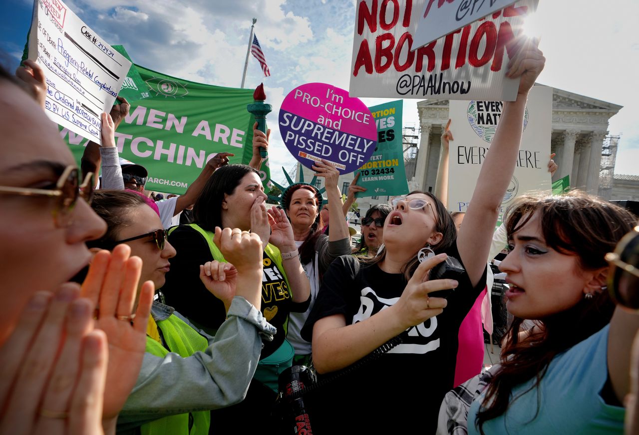 Abortion rights advocates and anti-abortion opponents clash outside the US Supreme Court on April 24 in Washington, DC. 