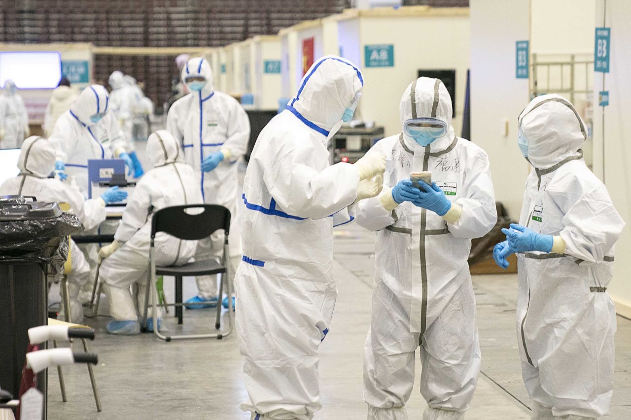 Medical staff convene at a temporary hospital in Wuhan on Monday.