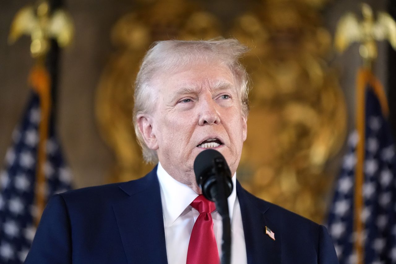 Former President Donald Trump speaks to reporters at his Mar-a-Lago estate on August 8, in Palm Beach, Florida.