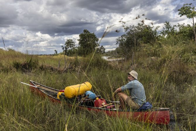 Steve Boyes takes a breather while unpacking his canoe.