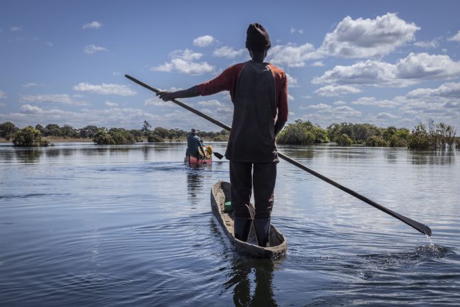 A traditional mokoro, or dugout canoe, carved from a hardwood tree, is the primary means of transport on the Chambeshi River.