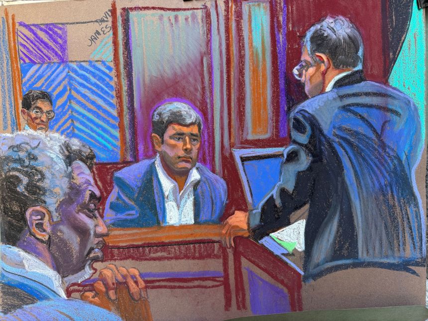 Sean Combs looks on as his former assistant David James testifies on Tuesday, May 20.