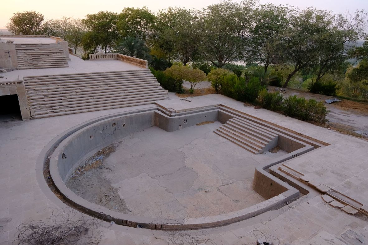 <strong>Faded glory: </strong>An empty swimming pool at the palace is testament to the luxury which the former dictator once afforded himself.