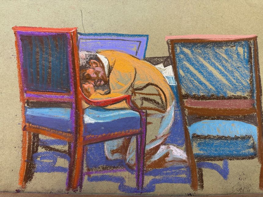 Combs on his knees following the verdict in his criminal trial.