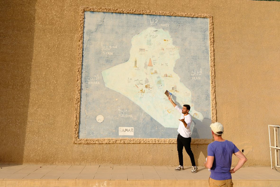 <strong>Location, location: </strong>Here Hashim shows Gianmaria Vergani a map of Iraq map detailing the country's major cities and their unique heritage sites.