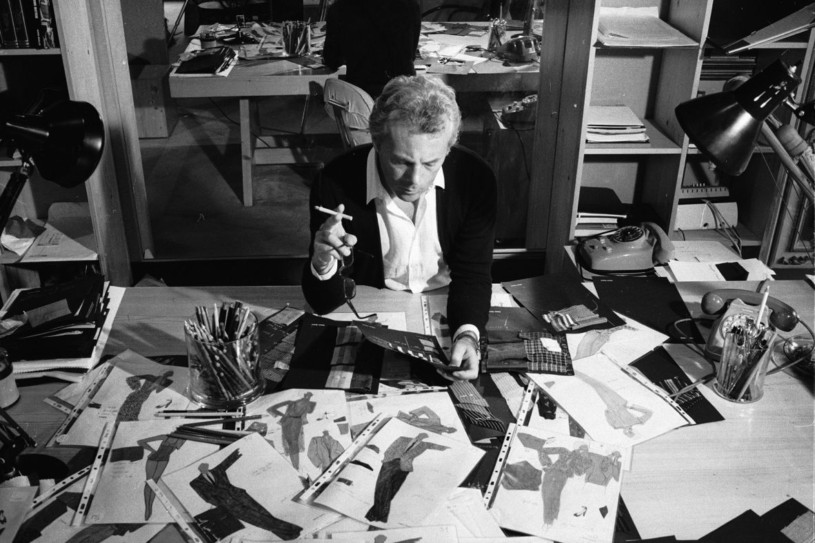 Armani examines drawings for new designs in 1979, the year he brought menswear and womenswear collections to America.