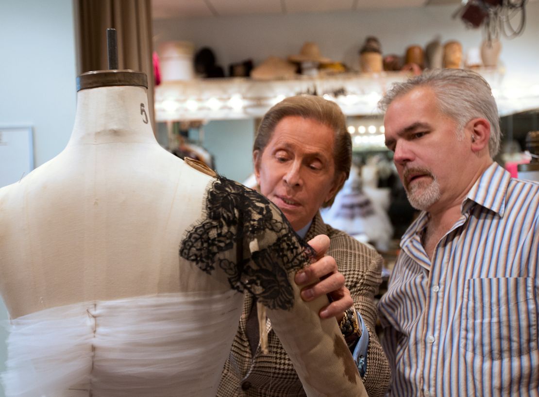 Happel (right) pictured with fashion designer Valentino Garavani in the New York City Ballet's costume studio amid preparations for the 2012 Fall Fashion Gala.