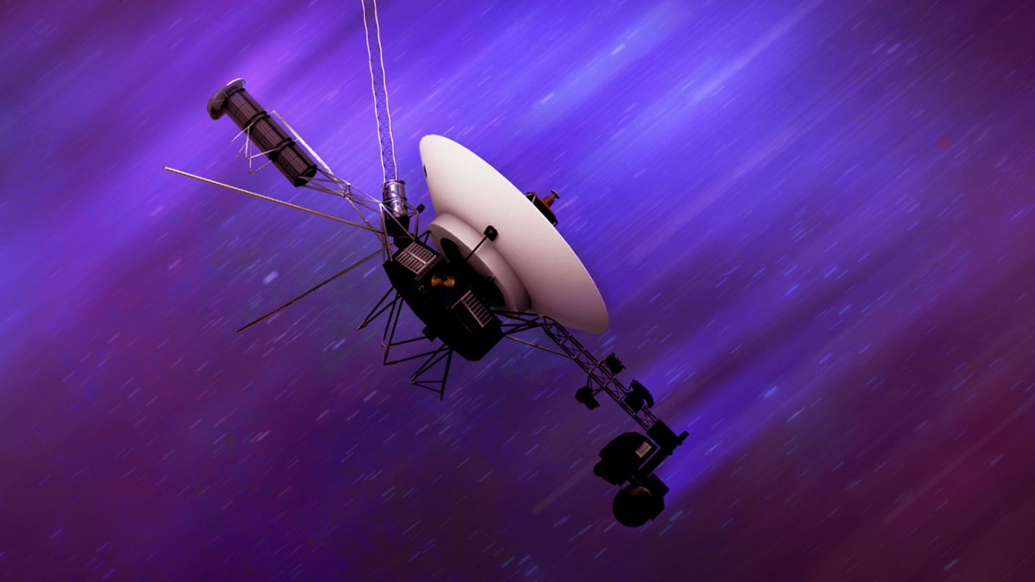 An artist's illustration shows one of the Voyager spacecraft flying through interstellar space at around 35,000 mph (56,000 kph).