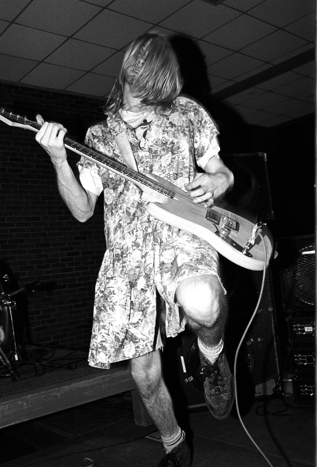 Kurt Cobain wears a floral dress during a gig in Amherst, Massachusetts, on April 28, 1990.