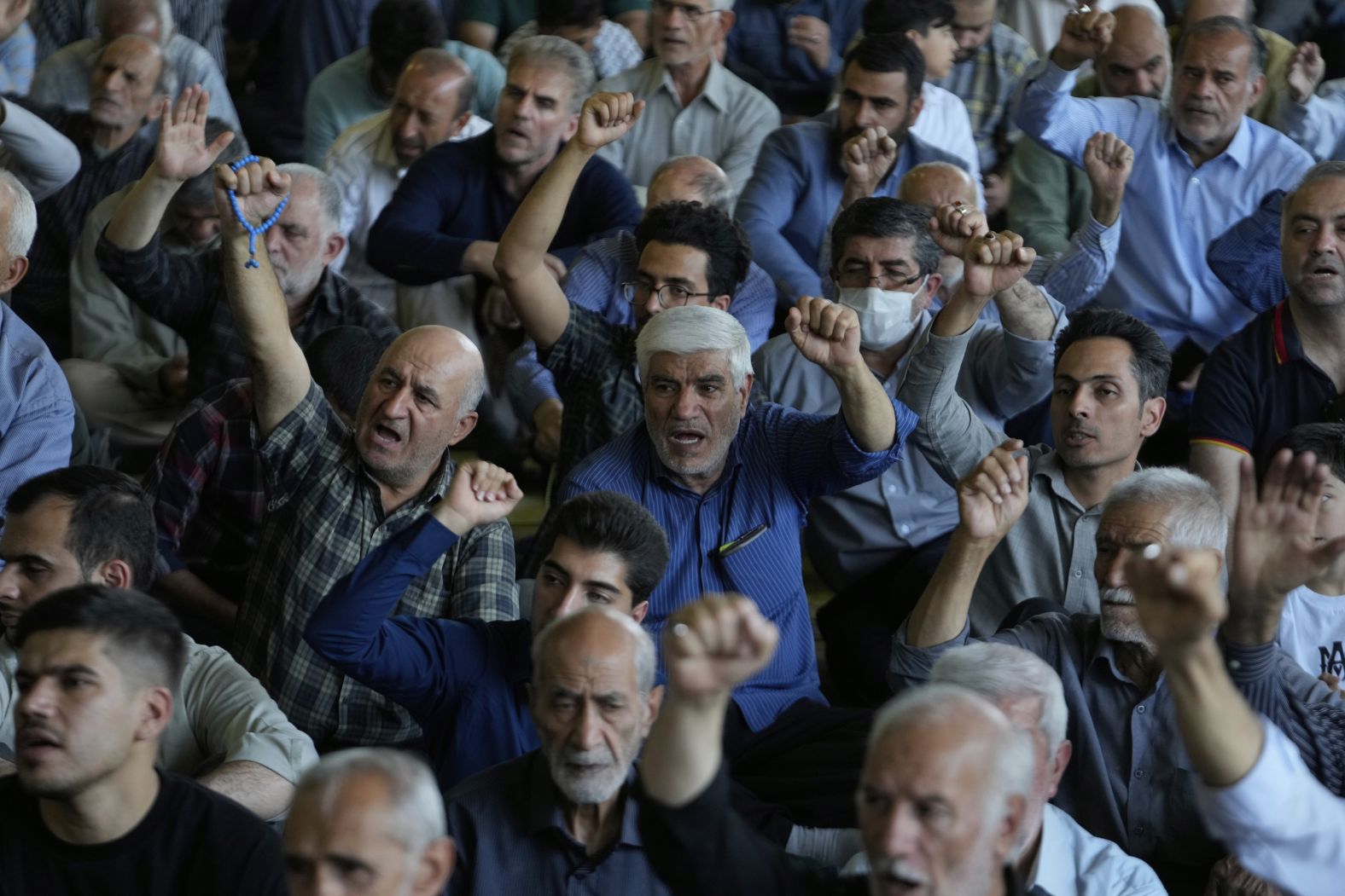 Worshippers chant slogans as they attend Friday prayers at Tehran University.