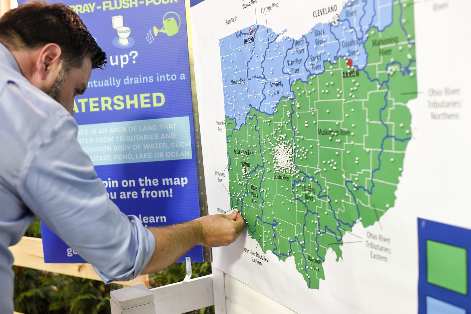 Vance puts a pin on an interactive map, marking the watershed near his home during a campaign event at the Ohio State Fair in Columbus in August 2022.