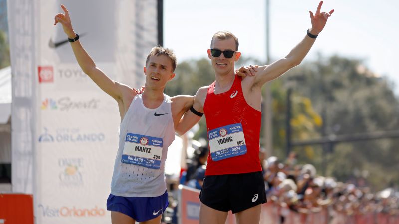 ORLANDO, FLORIDA - FEBRUARY 03: Conner Mantz (L) and Clayton Young celebrate after placing first and second during the 2024 U.S. Olympic Team Trials - Marathon on February 03, 2024 in Orlando, Florida. (Photo by Mike Ehrmann/Getty Images)