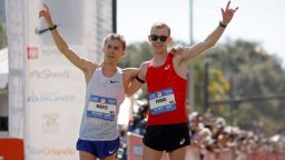 ORLANDO, FLORIDA - FEBRUARY 03: Conner Mantz (L) and Clayton Young celebrate after placing first and second during the 2024 U.S. Olympic Team Trials - Marathon on February 03, 2024 in Orlando, Florida. (Photo by Mike Ehrmann/Getty Images)