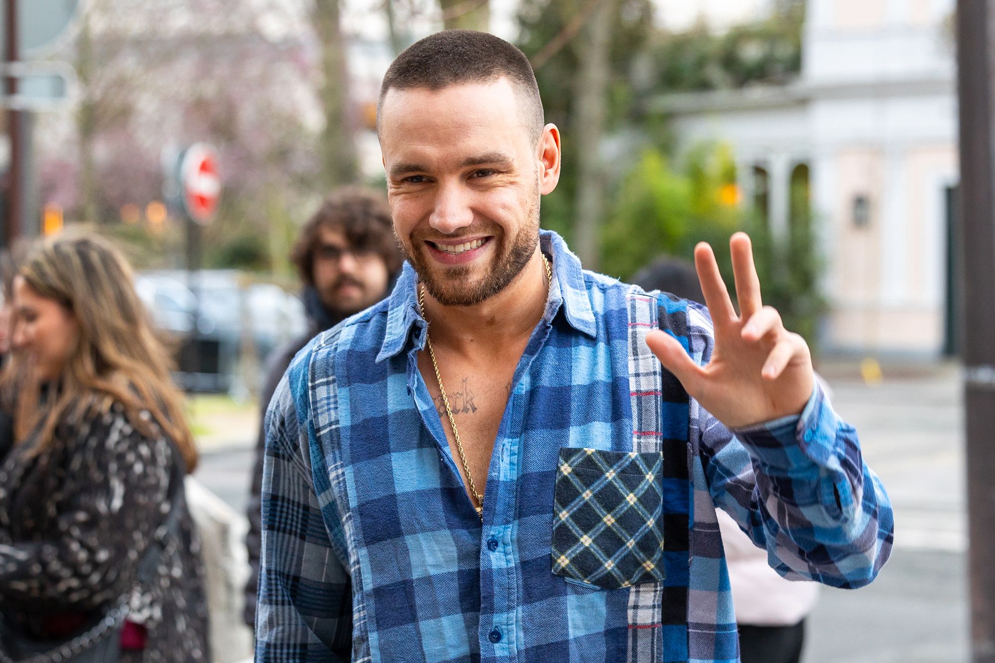 Payne smiles for cameras in Paris in March 2024.