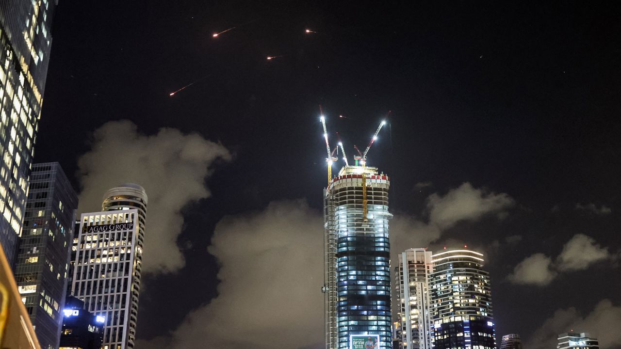 Projectiles are seen being intercepted by Israel above Tel Aviv.